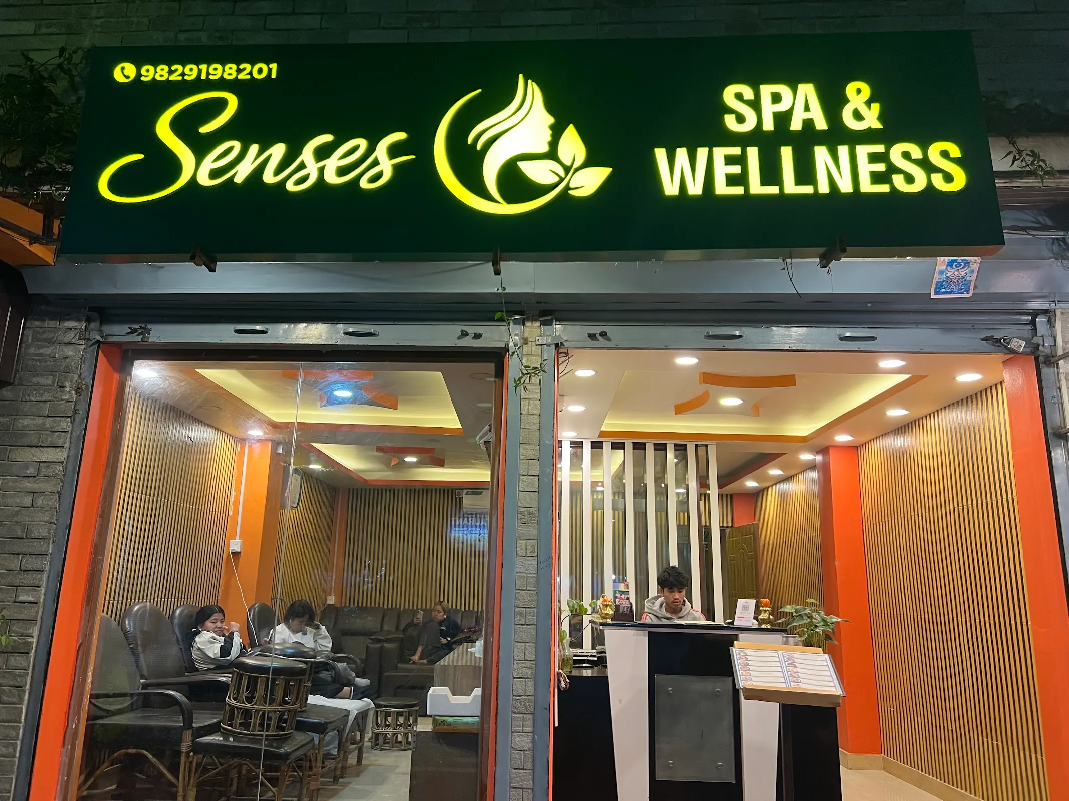 Senses Spa storefront on a Pokhara evening, illuminated brand sign